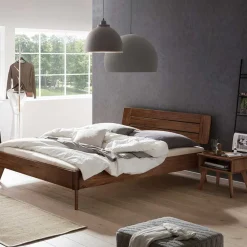 Wohnen Braune Möbel*Dunkles Holzbett aus Nussbaum Massivholz - Vetonia