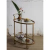 Wohnen Servierwagen|Couchtisch*Ovaler Serviertisch Burina auf Rollen in Messing mit Glas