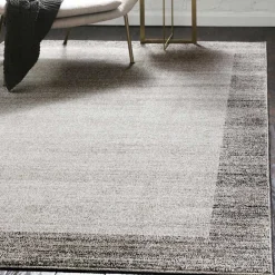 Wohnen Teppich in Hellgrau mit dunkelgrauem Rand - Armina