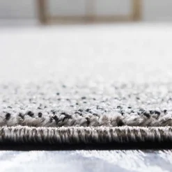 Wohnen Teppich in Hellgrau mit dunkelgrauem Rand - Armina