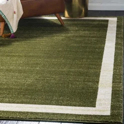 Wohnen Teppich in Oliv Grün mit Rahmen in Creme - Loritana