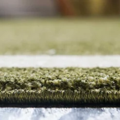 Wohnen Teppich in Oliv Grün mit Rahmen in Creme - Loritana