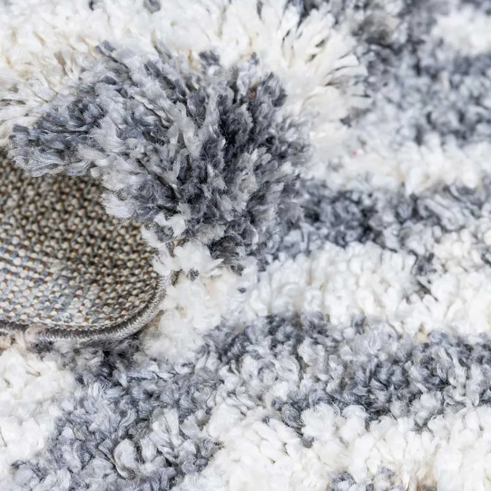 Wohnen Teppiche*Teppich mit handgeflochtenen Fransen in Creme und Grau - Juwan